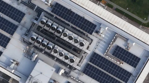 Aerial top down view of solar panels on industrial building roof Stock Footage 329555859
