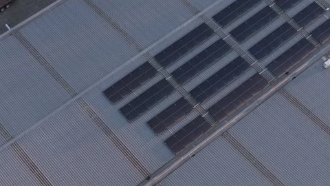 Aerial top down view of solar panels on a rooftop Stock Footage 346394627