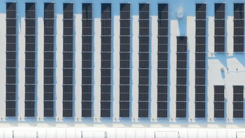 Aerial top down view of solar panels on a rooftop 스톡 동영상 348073738