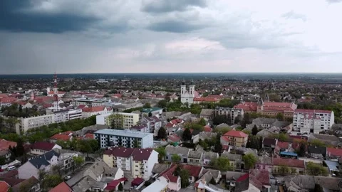 Aerial top down view of Sombor, St. Stefan Cathedral, beautiful moody sky Stock Footage