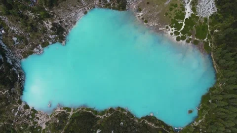 Aerial top down view of Sorapis lake in Dolomites mountain, Italian Alps Stock Footage 279640935