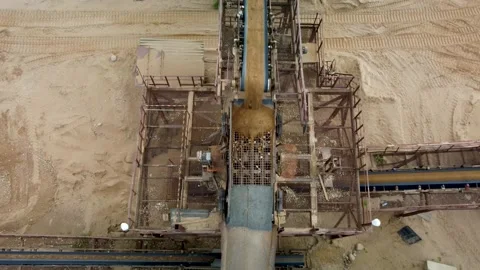 Aerial top-down view of sorting net and conveyour belts with sand and rocks. Stock Footage 170388254