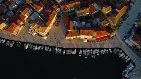 Aerial top-down view of stari grad marina in croatia at sunset Stock Footage 335792567