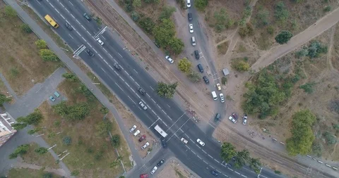 Aerial top down view of suburban crossroads with pedestrian walking Stock Footage 101500098
