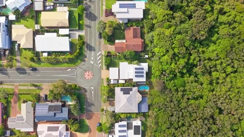 Aerial top-down view of Sunshine Coast suburb bordering coastal bushland re.. Stock Footage 333443389