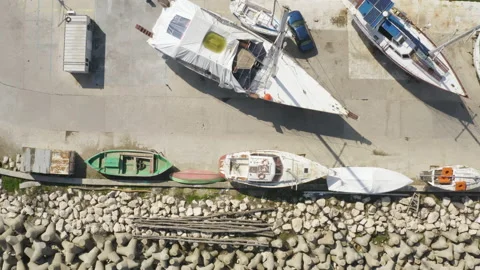 Aerial top-down view support and repair of yachts. Winter yachts conservation Stock Footage 236927535
