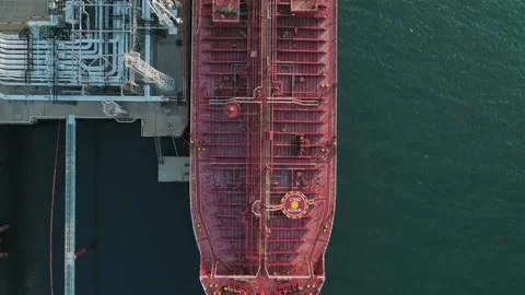 Aerial top down view of a tanker is loading in oil berth harbour terminal. Stock-Footage 196221655