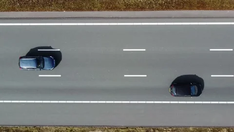 Aerial top down view of a three lane major highway 4k Stock Footage 155188734