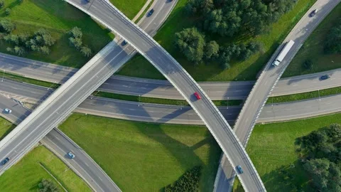 Aerial top-down view of three level road junction Stockbeeldmateriaal 228703255