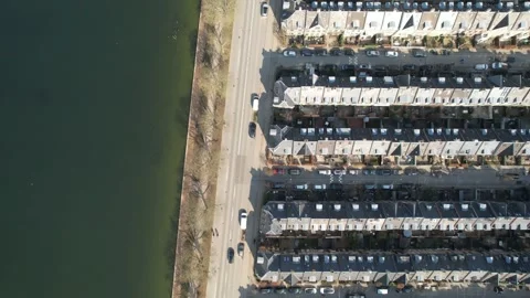 Aerial top-down view of tightly packed terraced houses in a residential Stock Footage 343538479