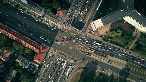 Aerial top down view time lapse of busy city intersection Stock Footage