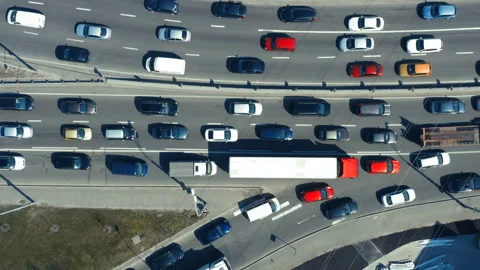 Aerial top down view of a traffic jam on a rush hour in a city Stock Footage 153948193