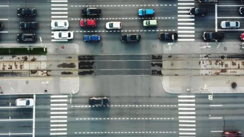 Aerial top down view of traffic jam on a car bridge and moving train. 4K video Video stock 247837218
