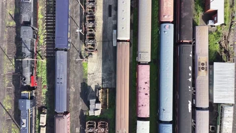 Aerial top down view of trains on railway tracks Stock Footage 339304575