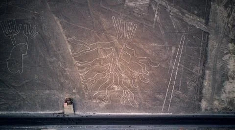 Aerial top-down view on "the Tree" and "the Lizard" one of the Nazca lines. Stock Photos