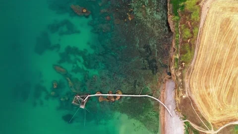 Aerial top down view of tropical white beach, blue and green sea,ocean, rocks Video stock 159860165