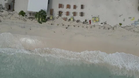 Aerial Top Down View Of Tropical Beach Resort With Turquoise Waves Video stock 340916475