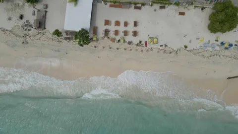 Aerial Top Down View Of Tropical Beach Resort With Turquoise Waves Stock Footage 340920475