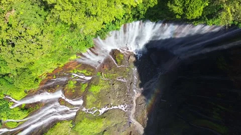 Aerial Top-Down View of Tumpak Sewu Waterfall with Rainbow Vídeos de archivo 345994135