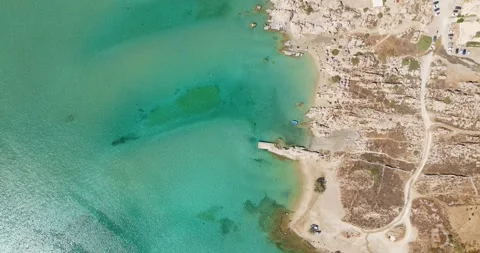 Aerial Top-Down View of Turquoise Coastline, Kolymbithres Beach, Paros Stock Footage 291727835