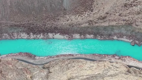 Aerial Top-Down View of Turquoise River Flowing Through Rocky Canyon Stock-Footage 334136274