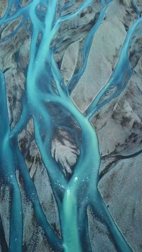 Aerial Top-Down View of Turquoise Glacial Braided River Stock Footage 337322909
