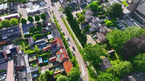 Aerial top down view of a typical Dutch town with modern houses and roads Stock Footage 337402804