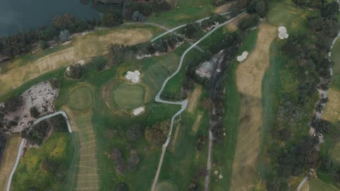 Aerial top-down view of a vast golf course Video stock 342524530