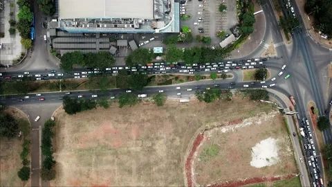 Aerial top-down view of  vehicles are moving on the street Stock Footage 156380375