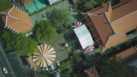 Aerial top-down view of vietnamese buddhist temple with festival tent Stock Footage 329496516
