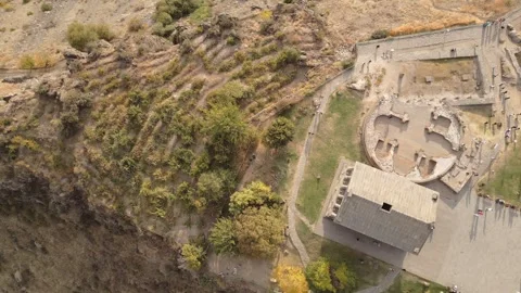 Aerial top down view visitors by The Garni Temple - classical colonnaded st.. Stock Footage 292896532