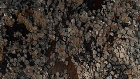 Aerial top down view of volcanic basalt formation on the sea in West Iceland Stock Footage 118431223