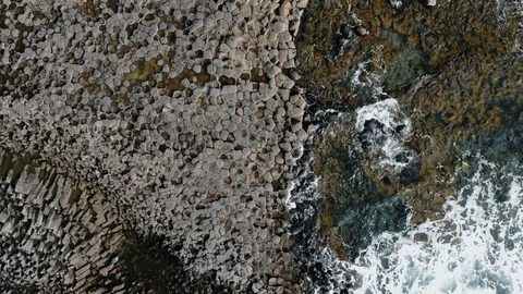 Aerial top down view of volcanic basalt formation on the sea in West Iceland Stock Footage 119790267