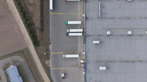 Aerial Top Down View Warehouse Loading Dock Trucks Logistics Center Stock Footage 332444021