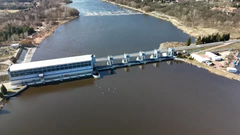 Aerial top down view of water discharge at hydroelectric power plant Stock Footage 304728931