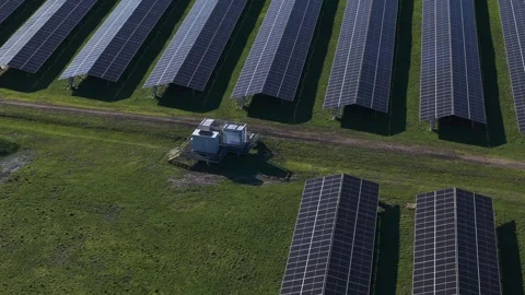 Aerial top-down view of a water tower in a suburban neighborhood Stock Footage 341231693