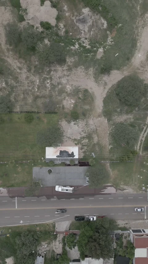 Aerial top down view of a water tanker truck parked beside a rural road near 스톡 동영상 341549213