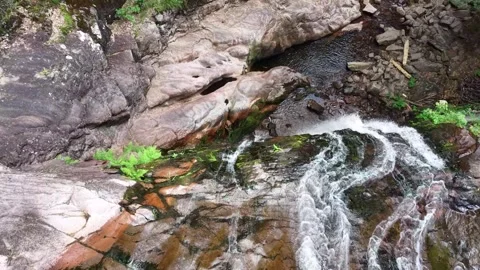 Aerial top-down view of a waterfall edge Stock Footage 340360392