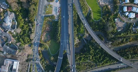 Aerial: Top down view of Waterview highway interchange, Auckland, New Zealan Stock-Footage 286921883