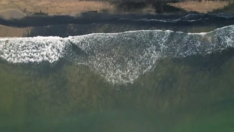 Aerial Top Down View Of Waves Crashing on Beach, 4K Drone View Stock Footage 170459772