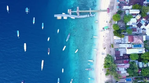 Aerial Top Down View Of white sand beach island village in Gili Trawangan, Bali Stock Footage