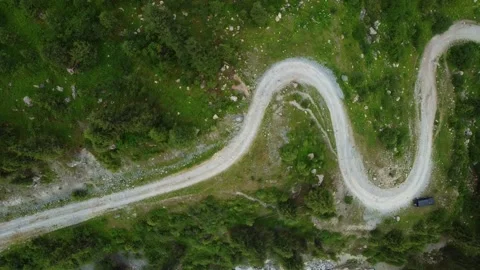 Aerial Top Down View of Winding Mountain Serpentine Road Video stock 331792769
