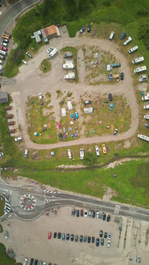Aerial top-down zoom timelapse nature campsite Alla Baita Dolomites Italy. .. Stock Footage 334547941