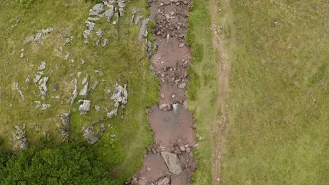 Aerial Top Drone View on stream with Green vegetation on mountains or valley of 스톡 동영상 119350945