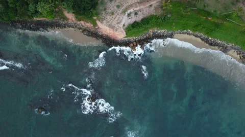 Aerial Top Drone View Of Waves Crashing On Rocky Coastline Stock-Footage 229916319