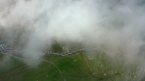 Aerial Top Forward Shot Of Clouds Moving Over River Stream Amidst Natural Stock Footage 201275875