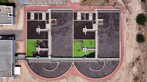 Aerial Top Lockdown Shot Of Process On Wastewater Treatment Seen Through Drone Stock Footage 260343660