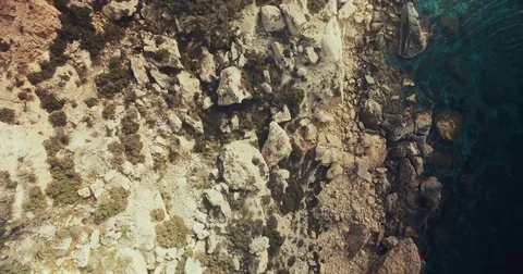 Aerial top Shot over Cliffs in Mellieha, Malta Stock Footage 75252147