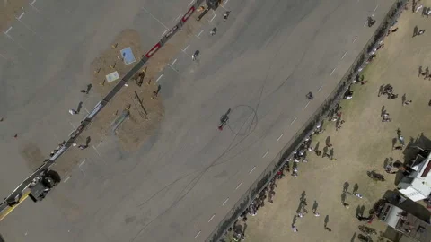 Aerial Top Shot Of Pattern Of Tire Tracks On Road At Concert Venue, Drone Flying Stock Footage 260442350