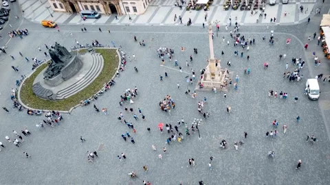Aerial top time lapse view of people walking over a town square Stock Footage 281827267